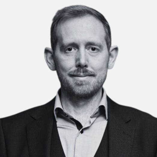 Black and white headshot of Gavin Pearson