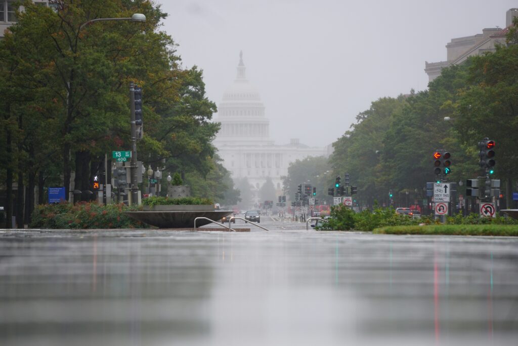 Rainy view down Pennsylvania Avenue from the Freedom Plaza to the Capitol Building, Washington DC